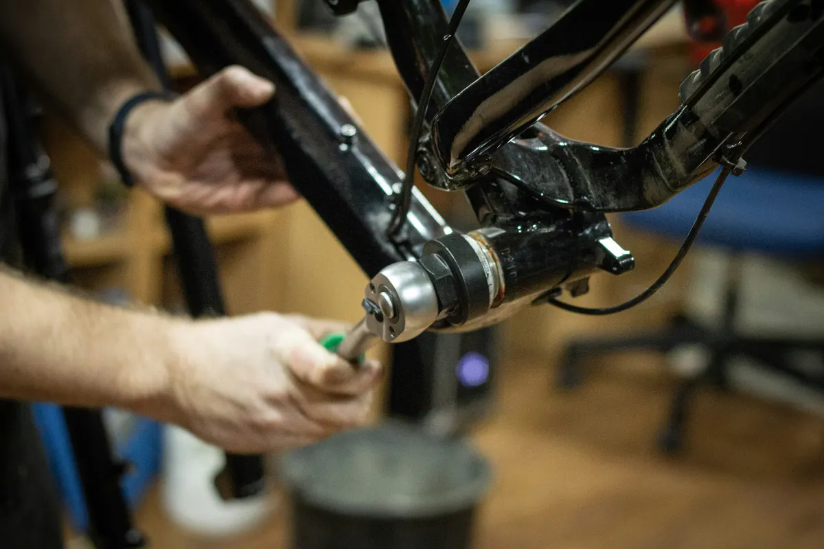 Bicycle repair workshop using an editable invoice PDF for parts and labour