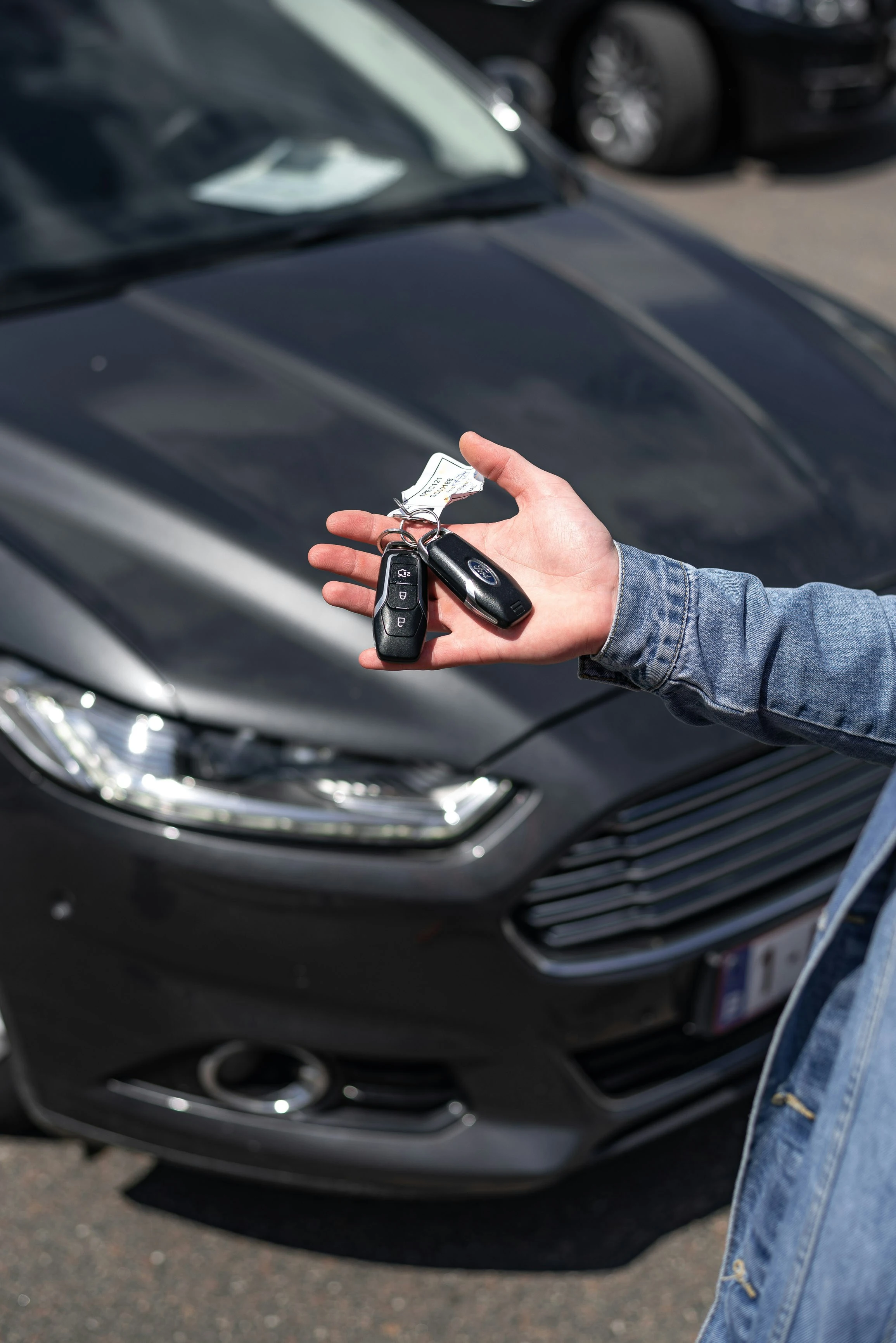 Car rental company preparing a vehicle rental invoice