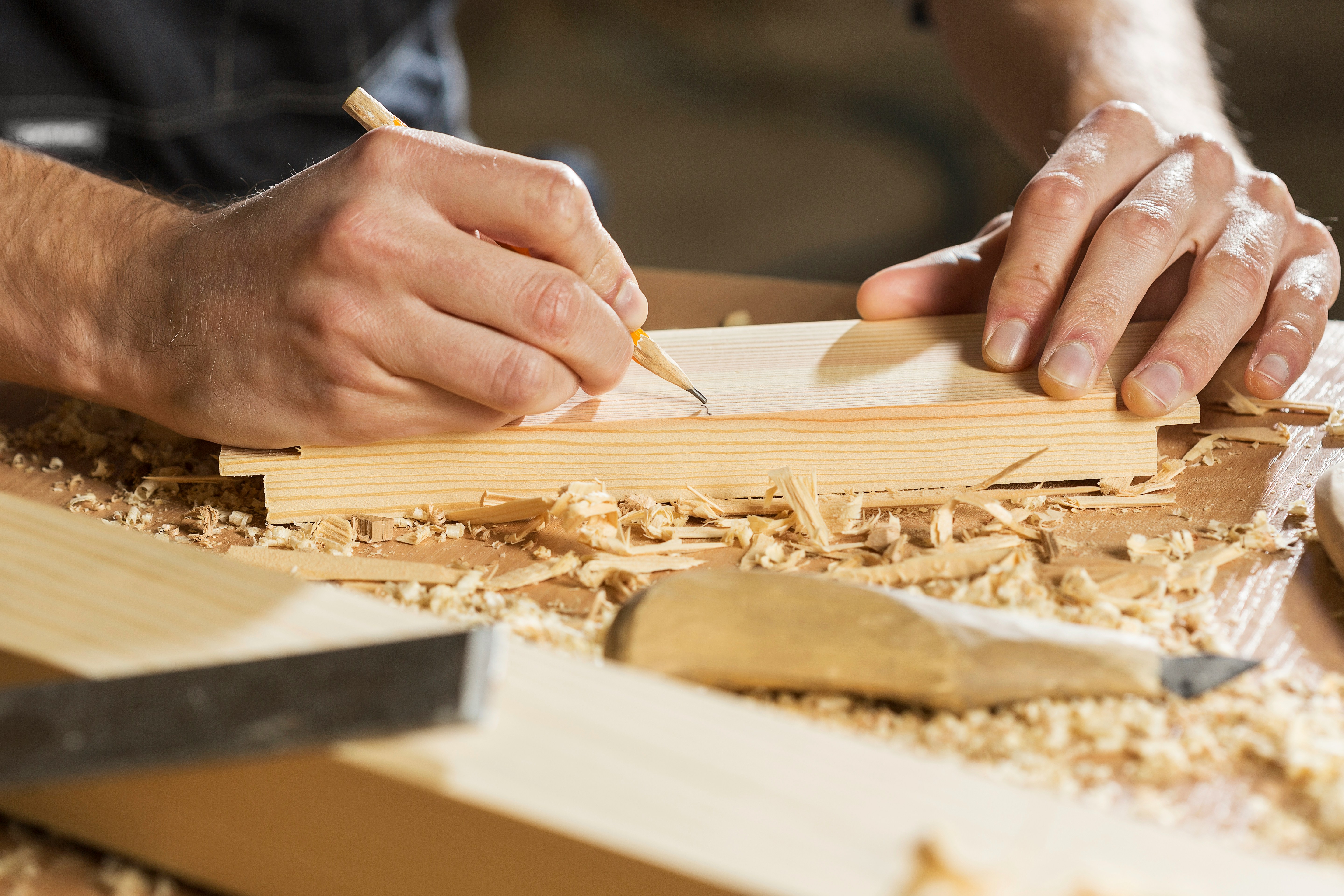Self employed carpenter creating a woodworking invoice template