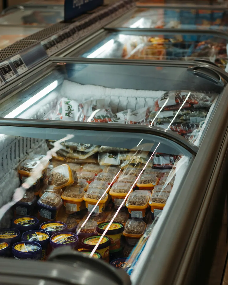 Commercial refrigeration technician preparing an invoice for refrigeration services