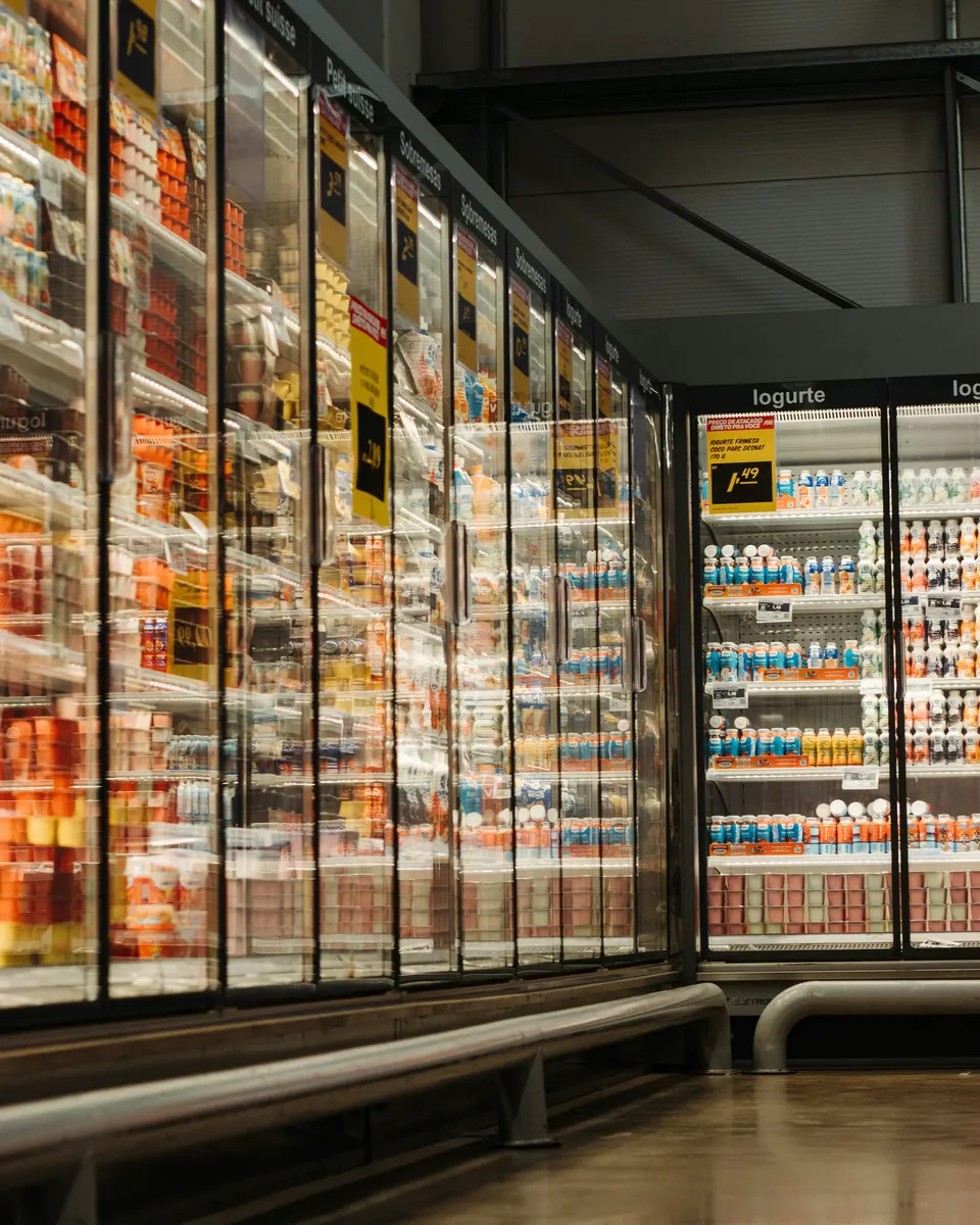 Refrigeration contractor repairing commercial refrigeration equipment