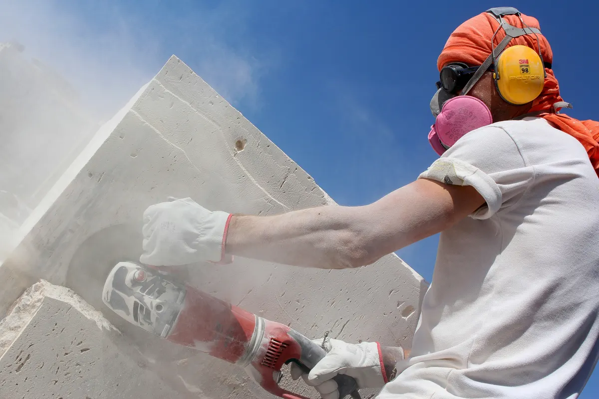 Concrete cutting contractor using professional cutting equipment on a job site
