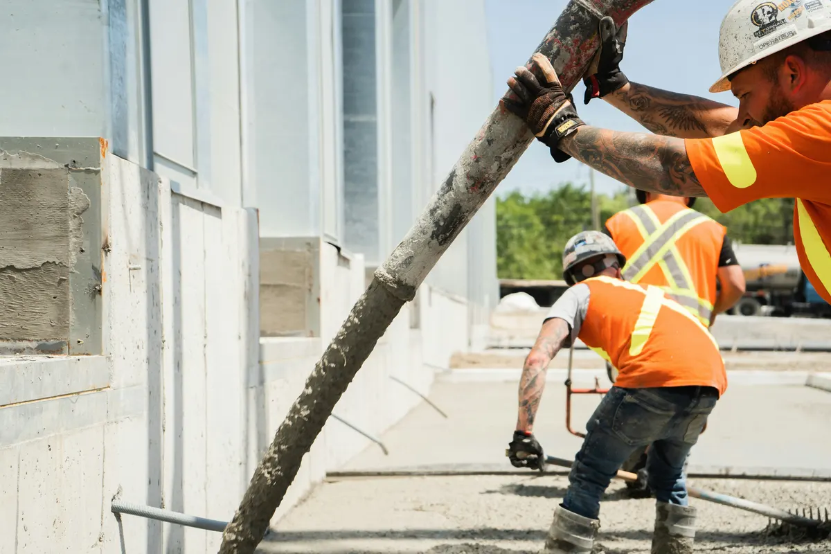 Concrete pumping contractor preparing an invoice for pumping services