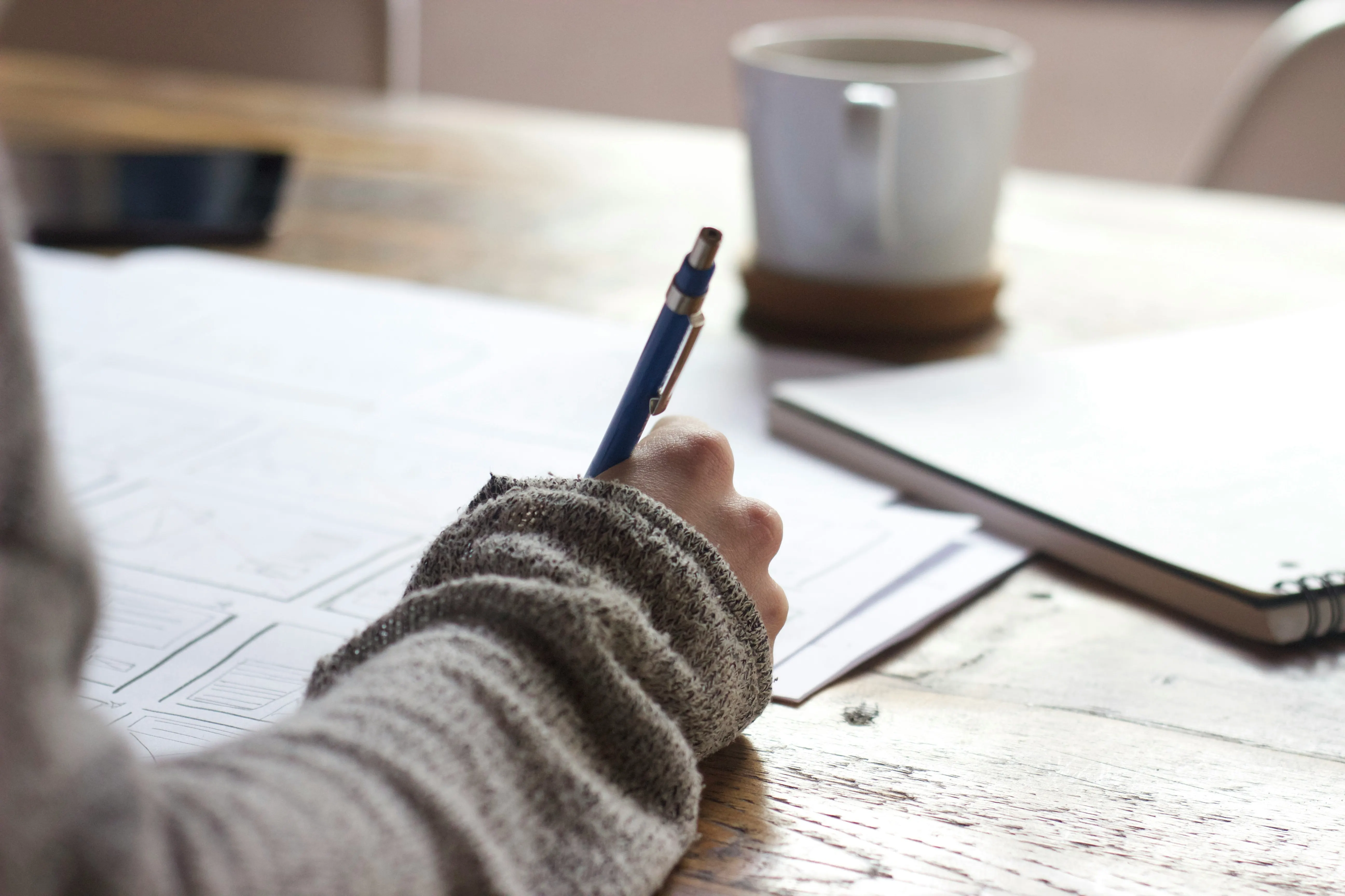 Freelance copywriter creating a professional invoice for writing services