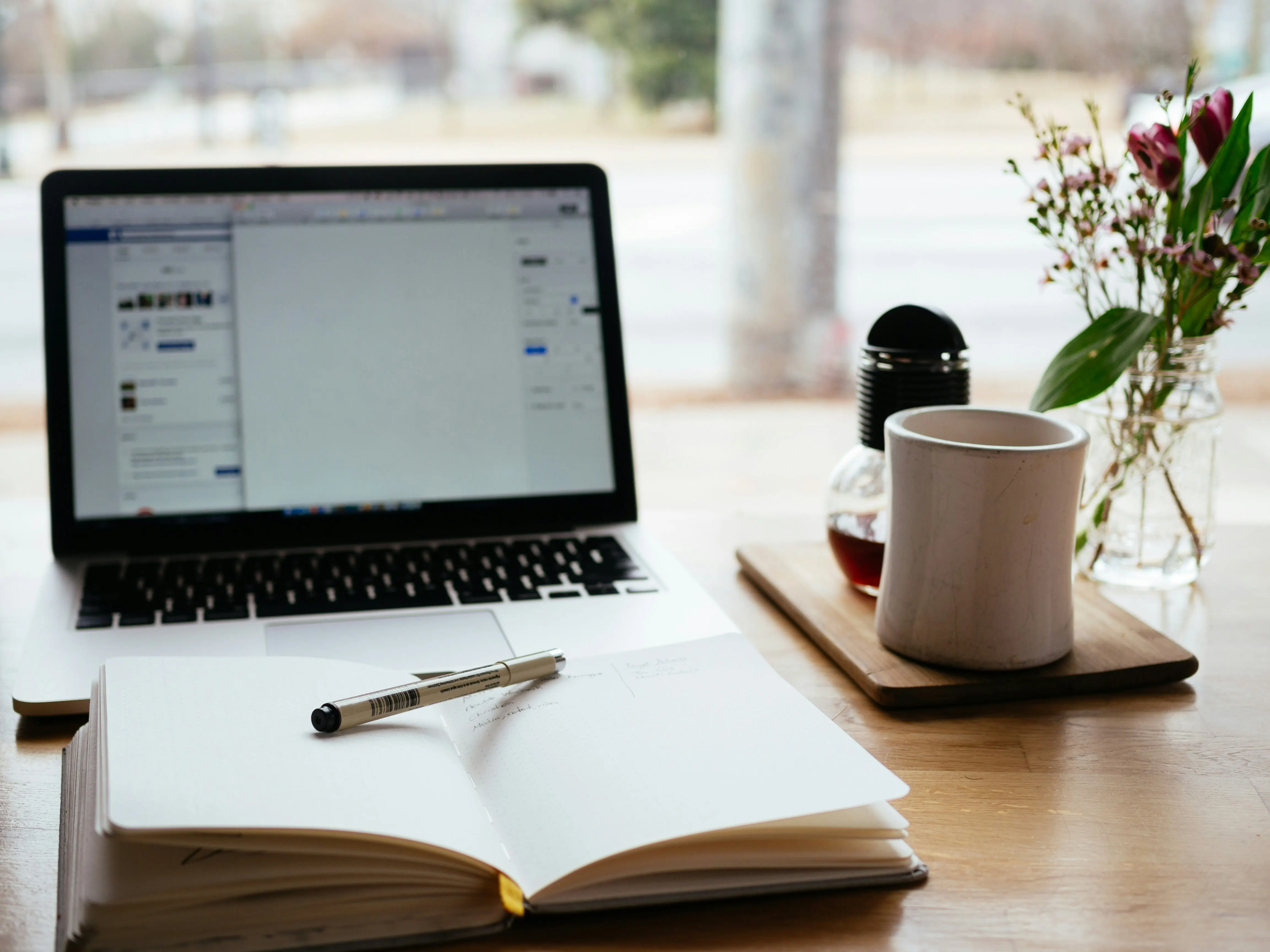 Copywriter reviewing writing projects and invoice examples
