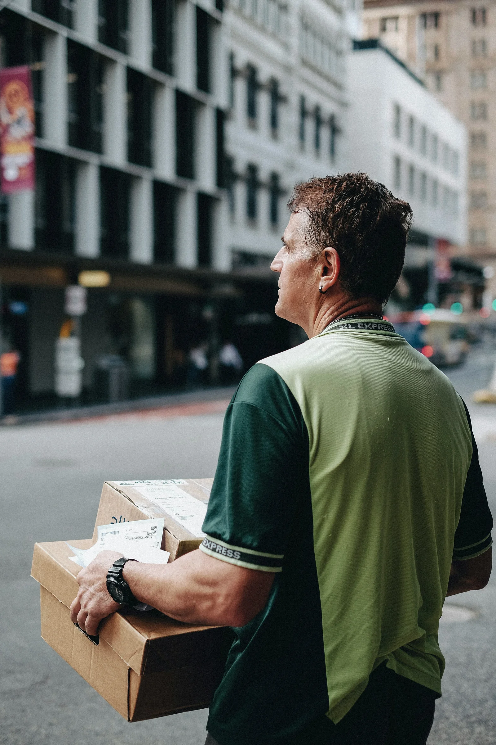 Courier driver preparing an invoice after completing deliveries