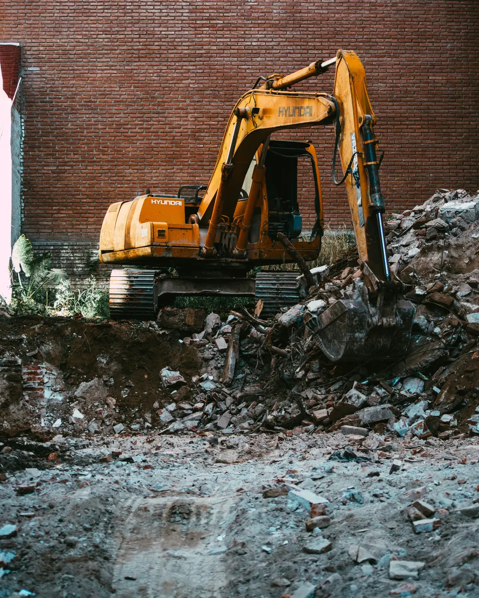 Demolition company creating an invoice for labour, machinery, and waste removal