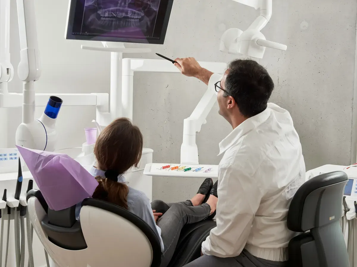 Dentist preparing a professional dental invoice