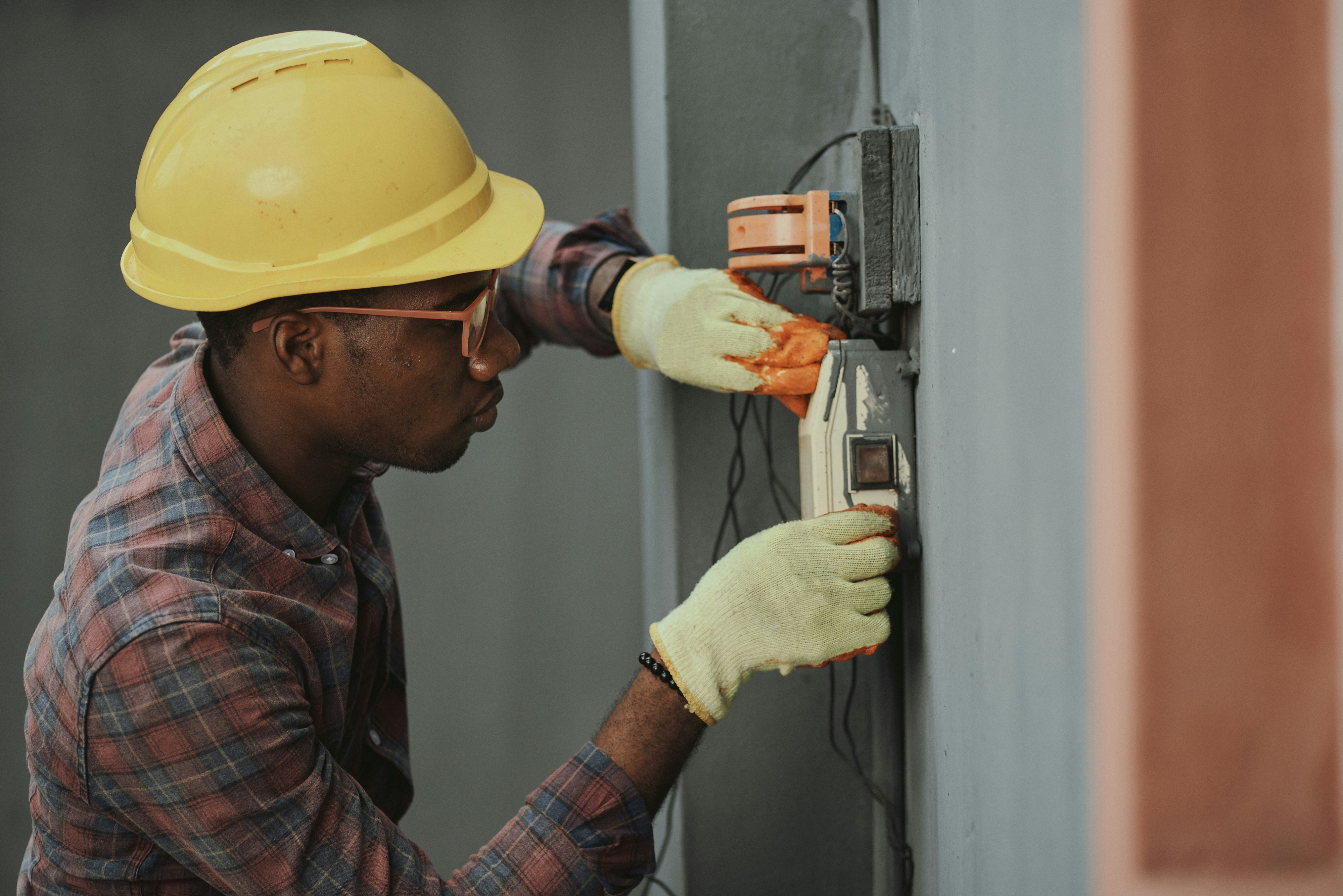 Electrician preparing an invoice for electrical work and installations