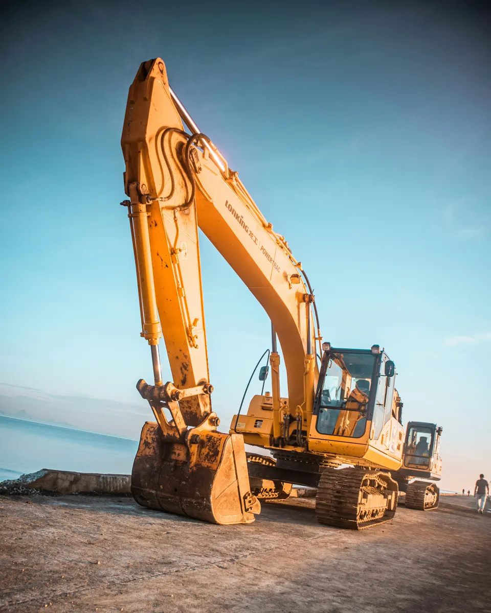 Excavation contractor reviewing site measurements and excavation costs
