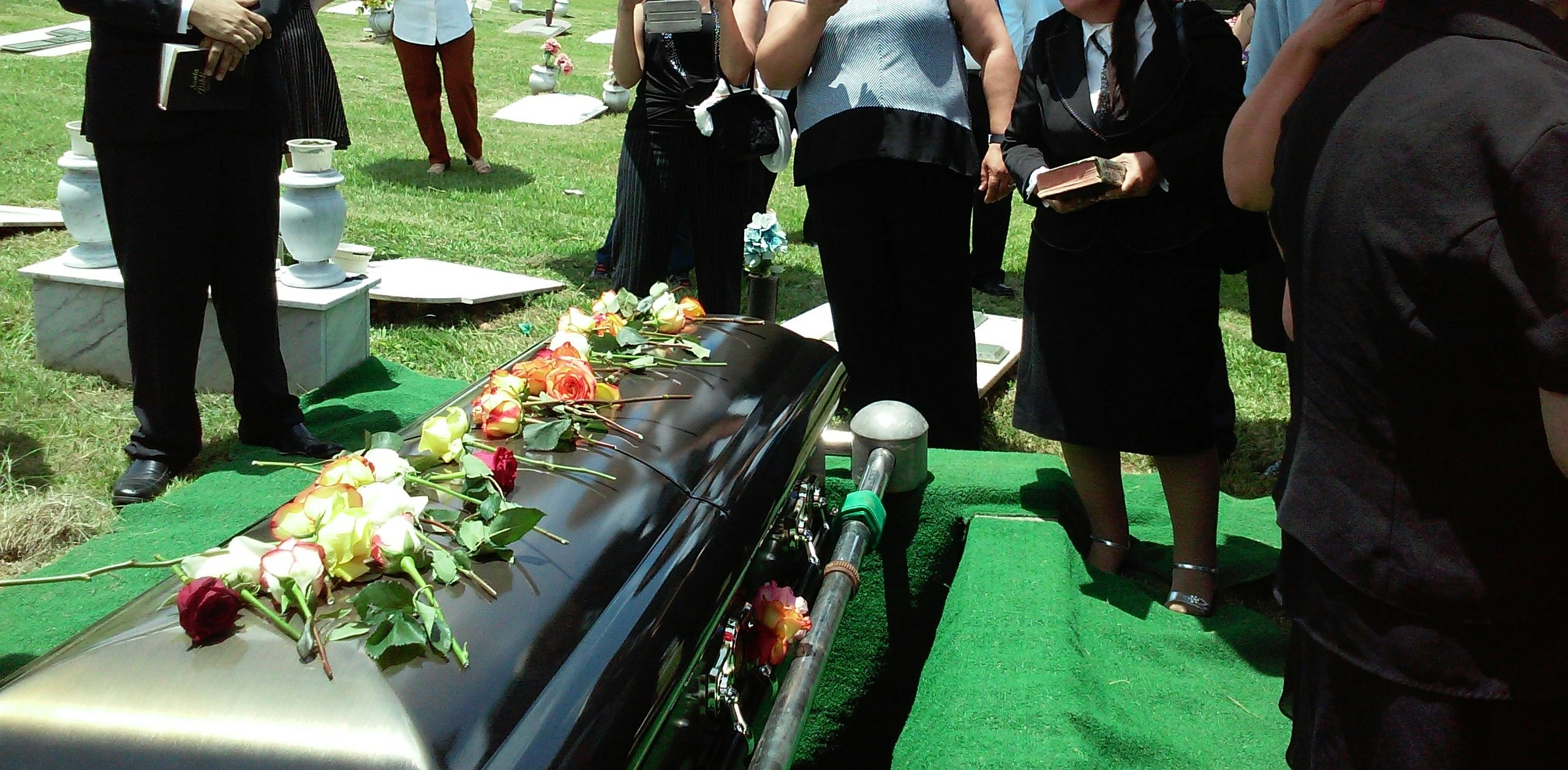 Funeral director preparing a professional funeral invoice