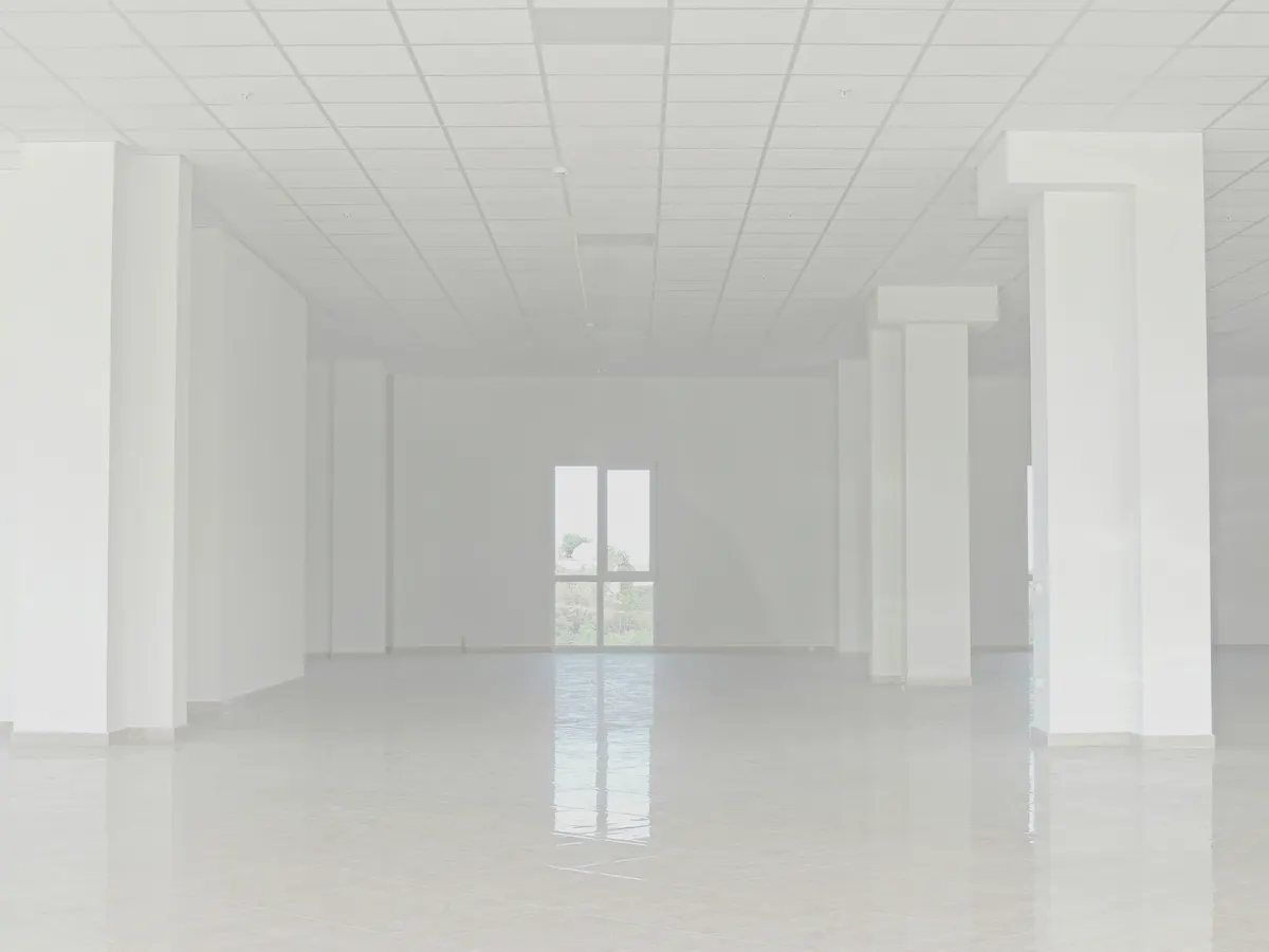 Contractor applying epoxy coating to a residential garage floor