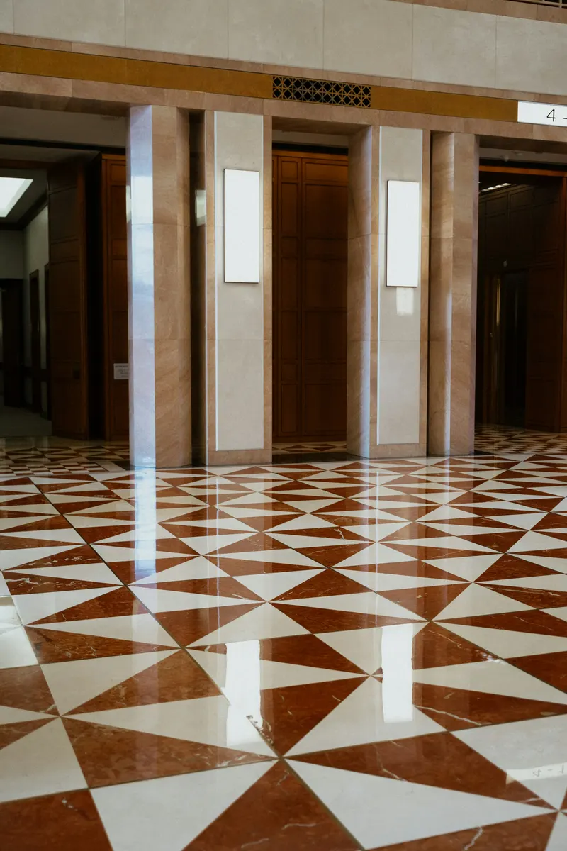 Epoxy flooring contractor calculating a quote and estimate for garage floor work