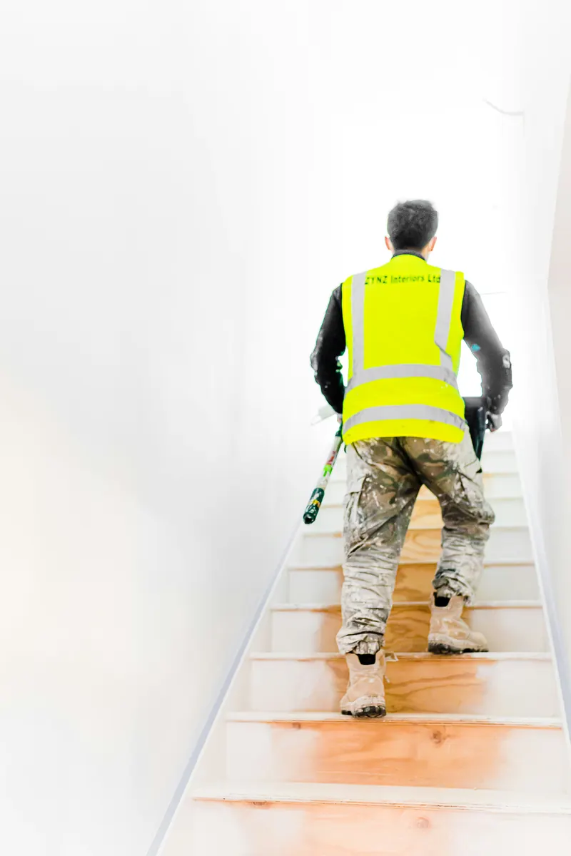 Property inspector completing an editable home inspection invoice template