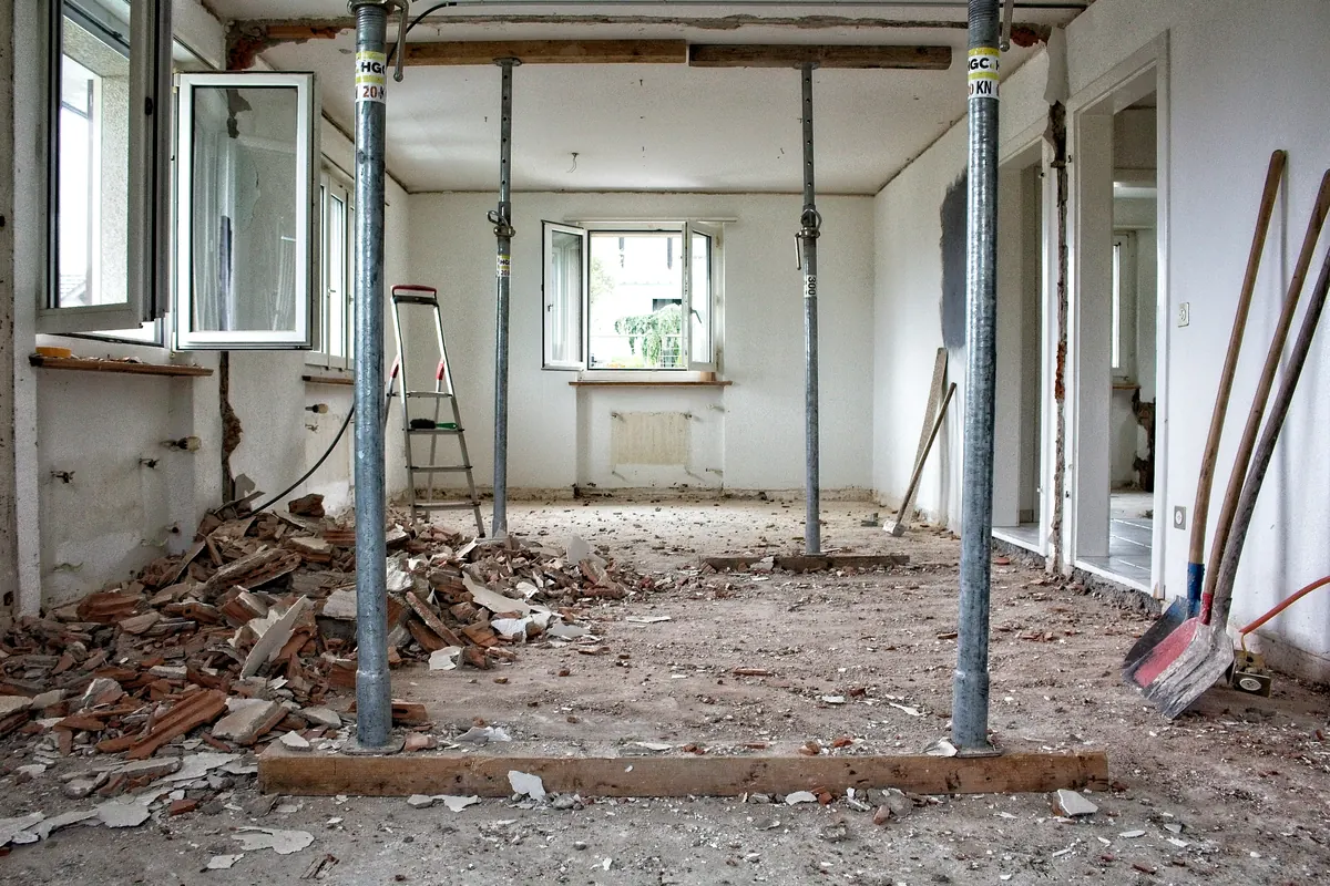 Home repair contractor preparing a home repair invoice template for residential maintenance work