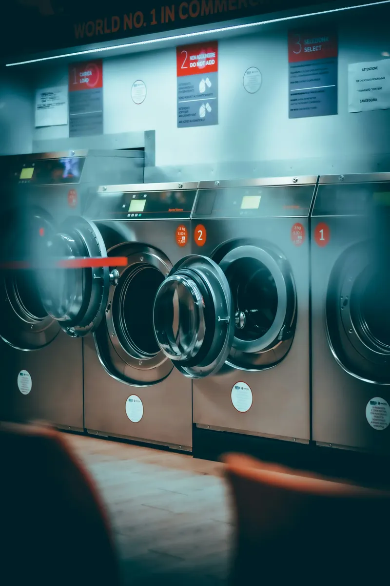 Laundry business preparing customer garments and laundry invoice details