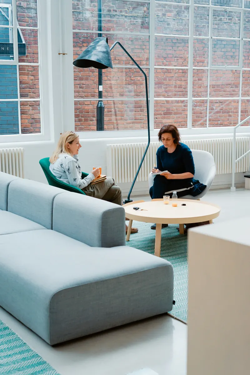 Life coach preparing a life coaching invoice template for a client