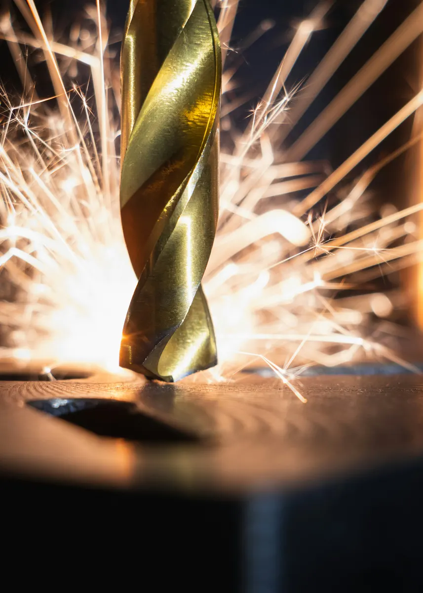 Machinist preparing a machine shop invoice for CNC machining work