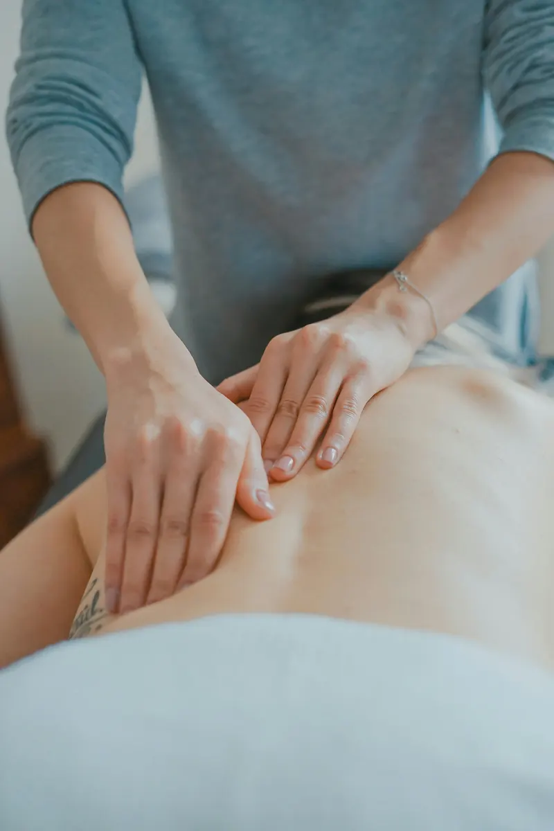 Massage therapist preparing a massage therapist invoice template