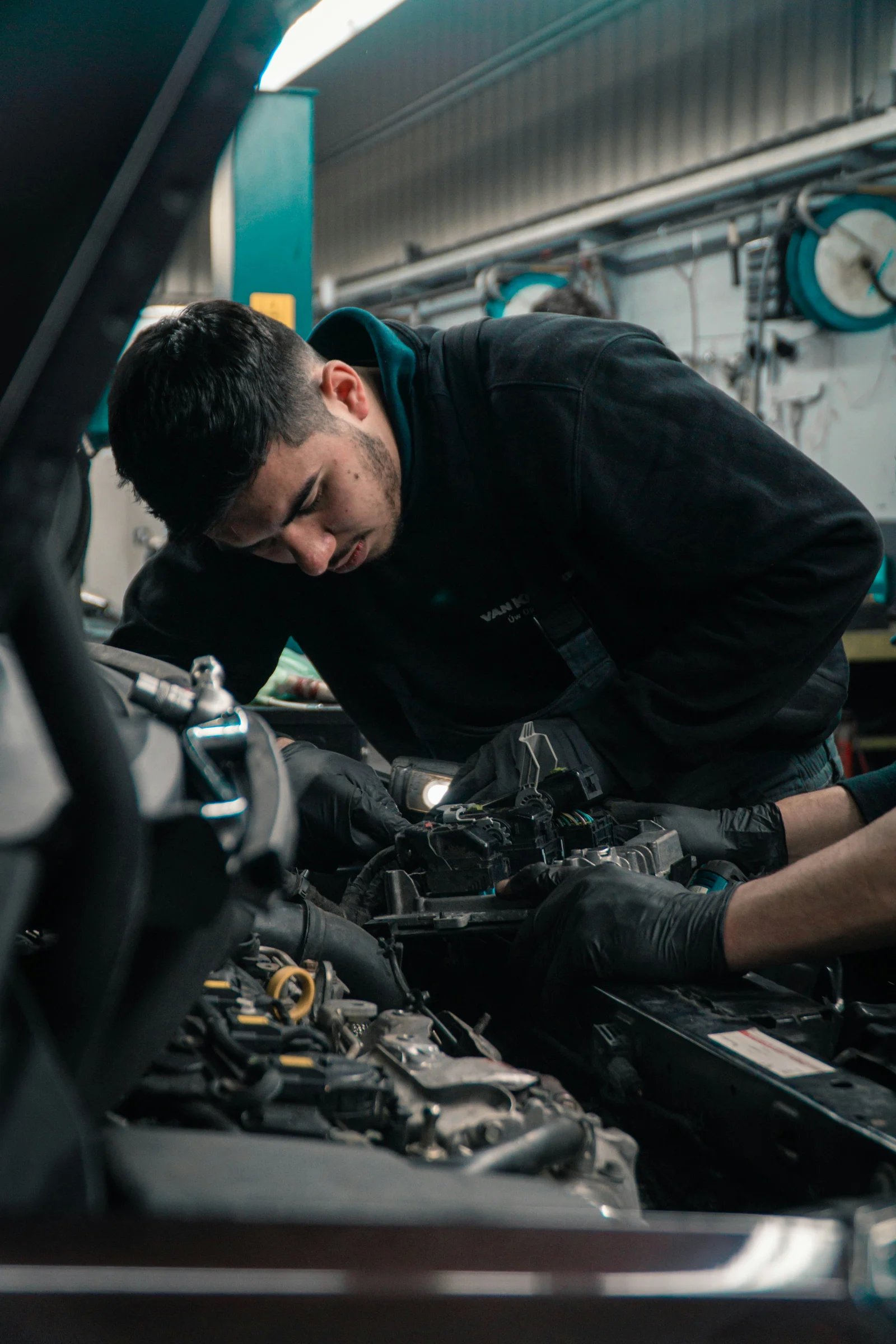 Mechanic preparing an invoice for vehicle repair work