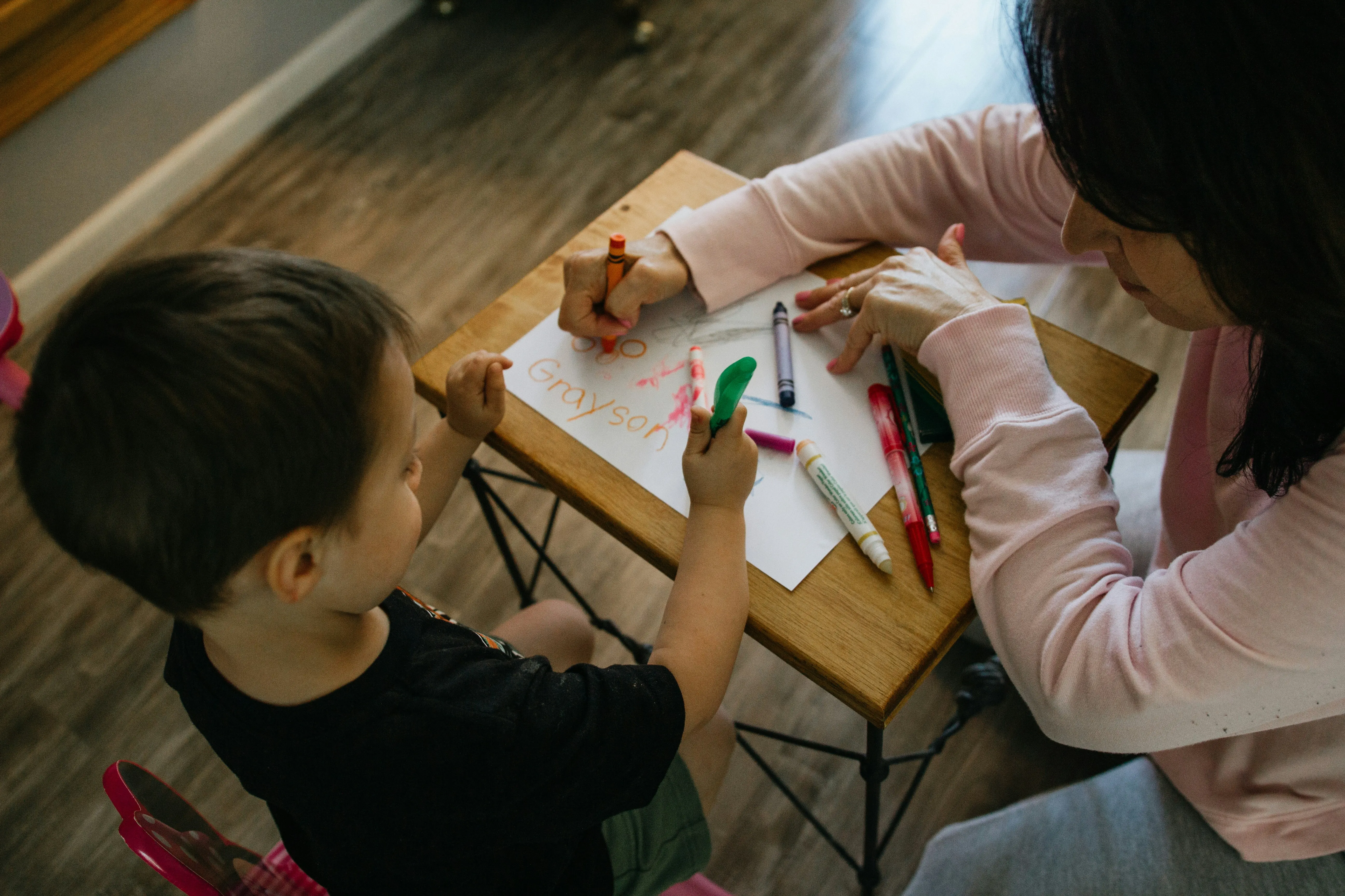 Childcare provider preparing a childcare invoice template for daycare and nursery services