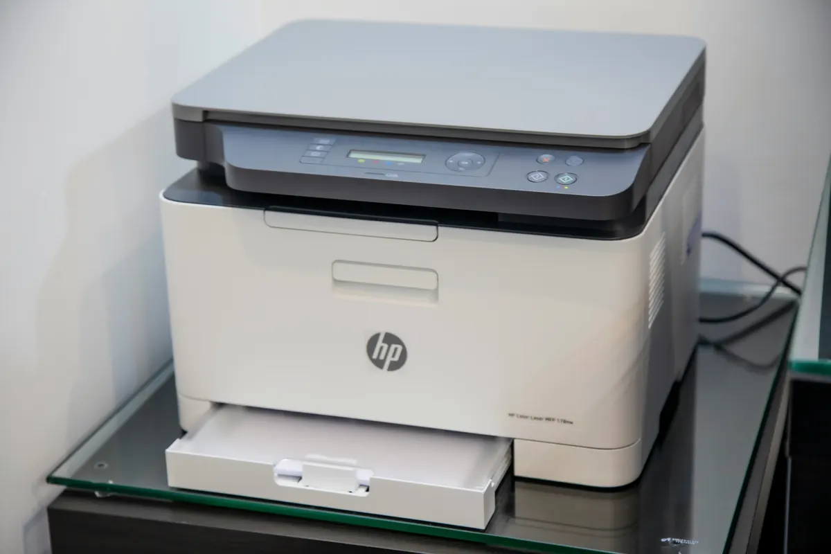 Business owner completing an invoice to print for a customer