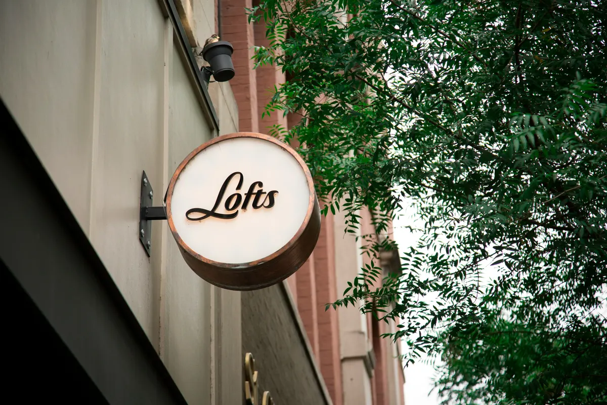 Custom signage business reviewing sign fabrication and installation charges