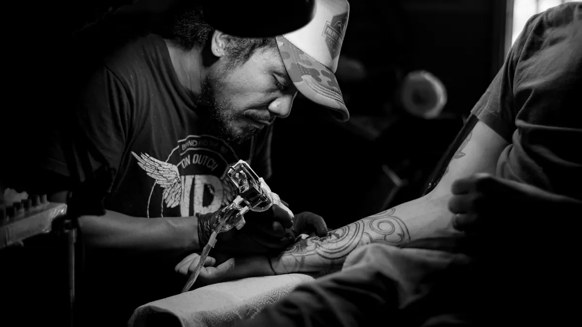 Tattoo studio completing an editable tattoo invoice template
