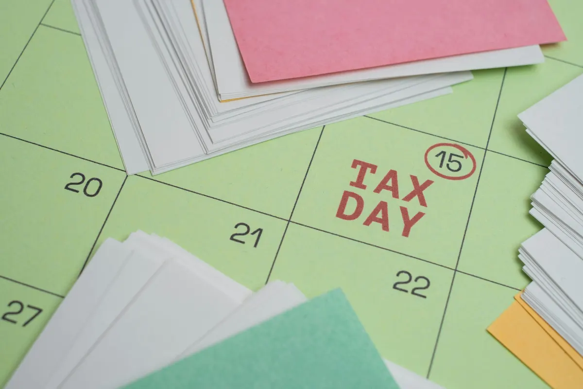 Tax consultant preparing an invoice for professional tax services