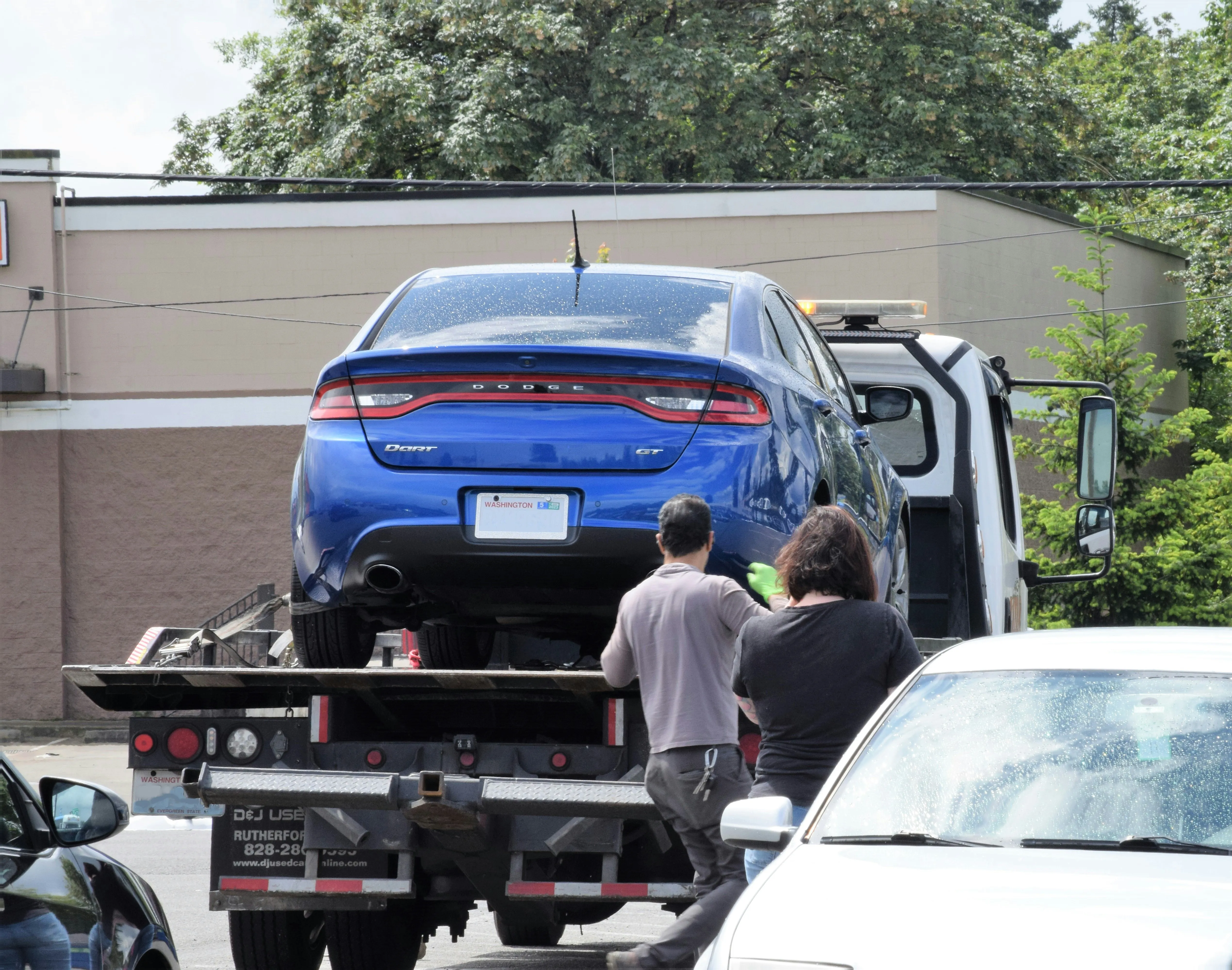 Towing company using a towing service invoice template for roadside assistance billing