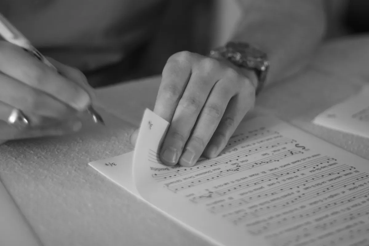 Freelance transcriptionist reviewing a transcription invoice example