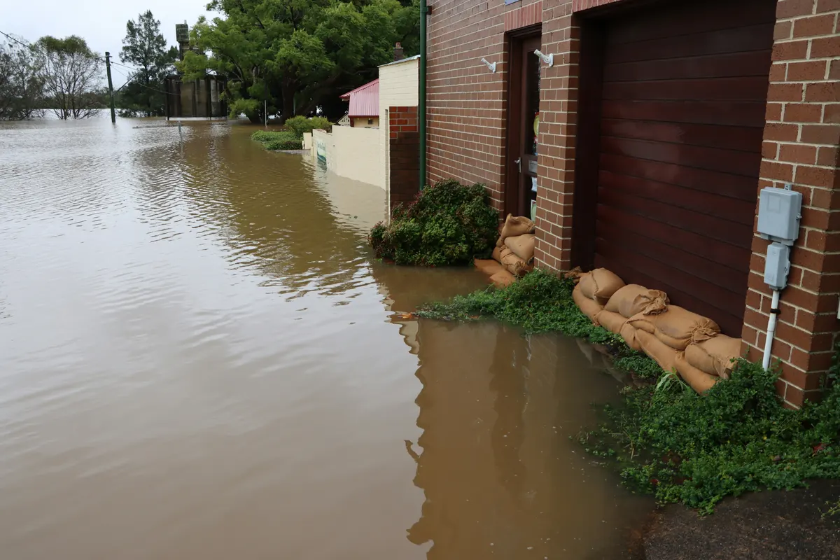 Water mitigation company preparing an invoice for drying and restoration services