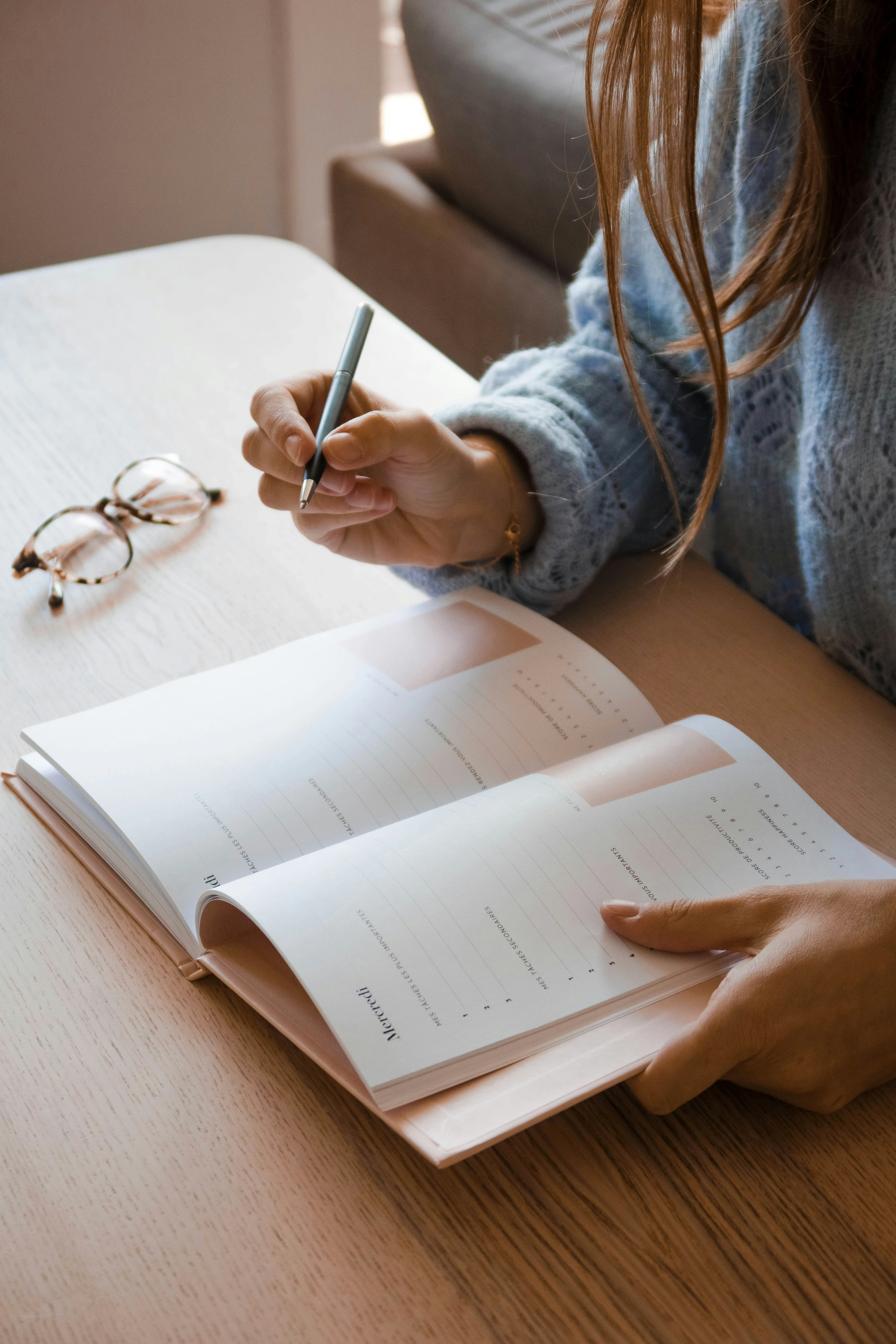 Wedding planner creating an invoice for wedding planning services
